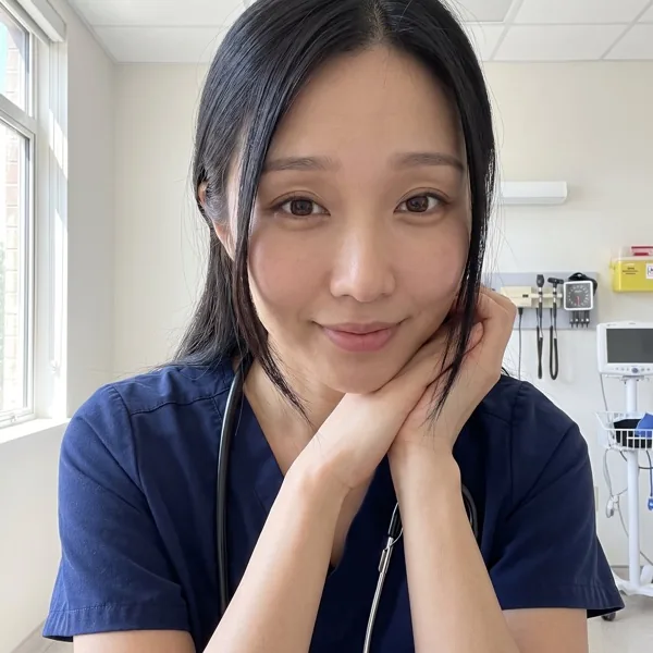 Ayaa smiling at the clinic